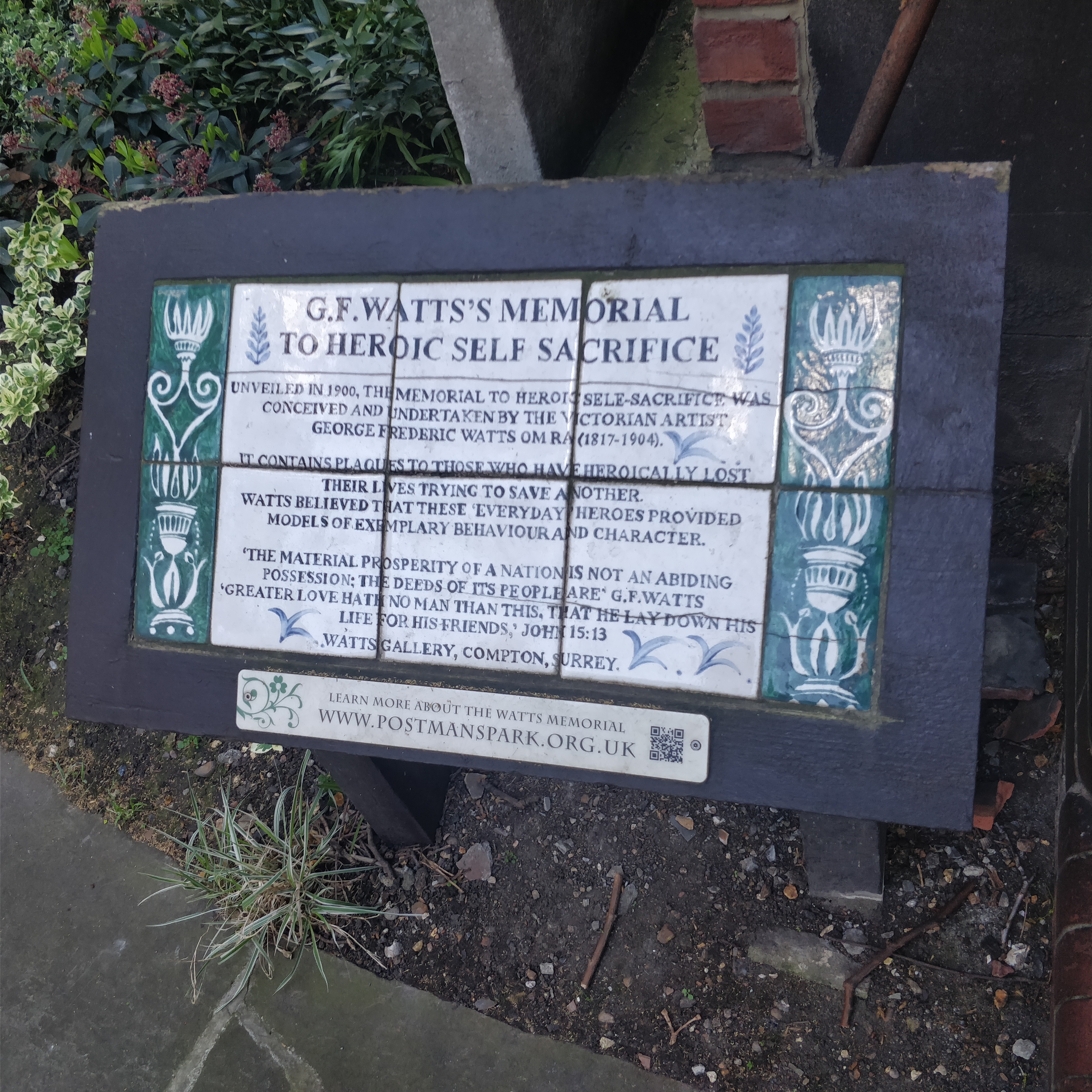 A plaque denoting GF Watt's Memorial to Self-Sacrifice 
